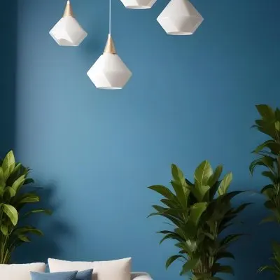 A Modern Living Room With A White Sofa A Potted Plant And Geometric Pendant Lights Hanging From The Ceiling Against A Blue Wall 24 Be41