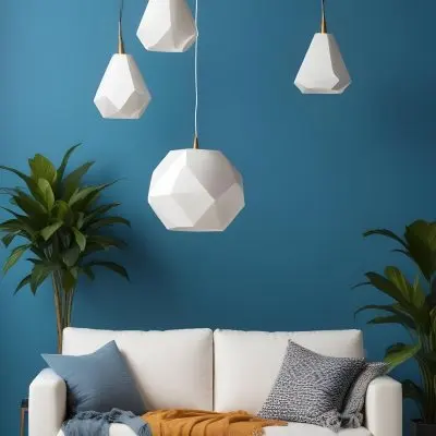 A Modern Living Room With A White Sofa A Potted Plant And Geometric Pendant Lights Hanging From The Ceiling Against A Blue Wall 27 18f0