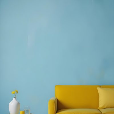 A White Sofa With A White Pillow A Yellow Vase And A Glass On A Table In Front Of A Yellow Wall 13 C276