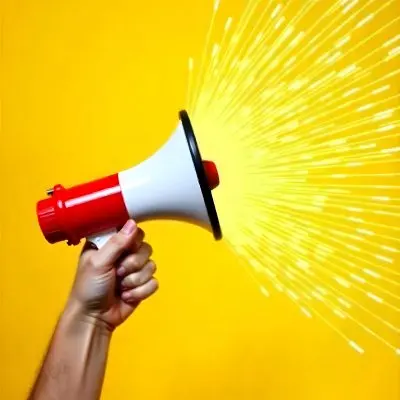 A Hand Holding A Red And White Megaphone With Yellow Rays Coming Out Of It White Background 4 Dd2b