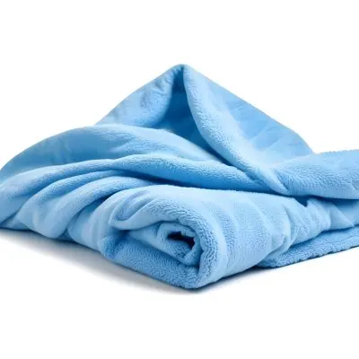 A Light Blue Towel Terrycloth Texture Folded And Crumpled Soft And Absorbent For Drying Or Cleaning On A White Background 7 156d