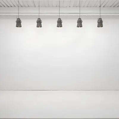 A Minimalist White Room With A High Ceiling And Hanging Pendant Lights 52 Ec33