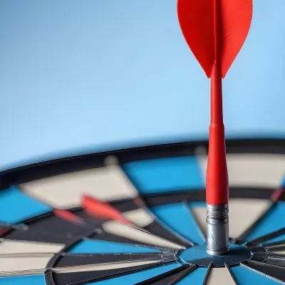A White And Blue Target With An Arrow In The Center On A Blue Background 12 90ab