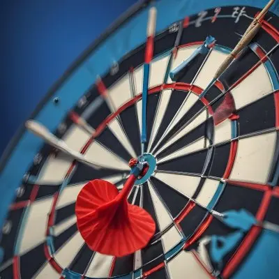 A White And Blue Target With An Arrow In The Center On A Blue Background 15 6c2e