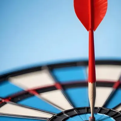 A White And Blue Target With An Arrow In The Center On A Blue Background 16 9ebd