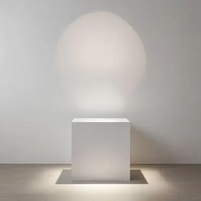 A White Cube Shaped Object On A Plain Background With A Bright Light Source Above It 11 0ab5