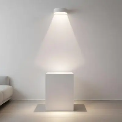 A White Cube Shaped Object On A Plain Background With A Bright Light Source Above It 13 Dfea