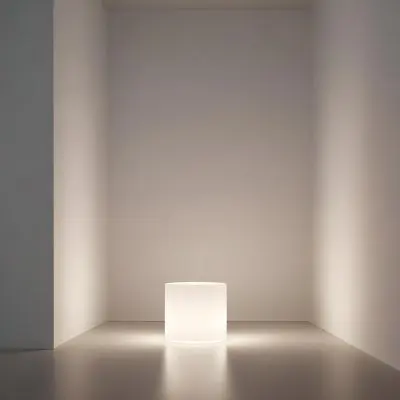 A White Cube Shaped Object On A Plain Background With A Bright Light Source Above It 21 88ab