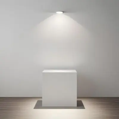 A White Cube Shaped Object On A Plain Background With A Bright Light Source Above It 3 2db8
