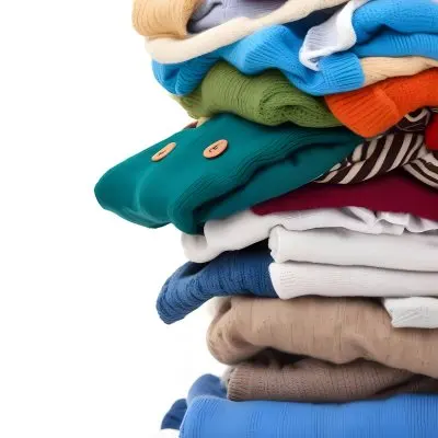 Pile Of White Folded Clothes Including Sweaters Pants And Sweaters Stacked Haphazardly On Top Of Each Other Creating A Organized And Organized Mess Colorful Background 36 B4ff