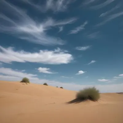 A Desert Landscape With Sand Dunes And Sparse Vegetation Under A Bright Blue Sky With Wispy Clouds Arid Environment 34 3042