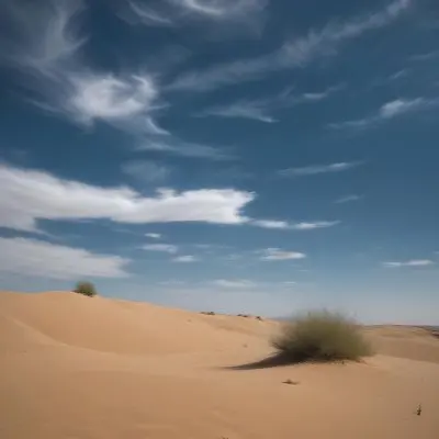 A Desert Landscape With Sand Dunes And Sparse Vegetation Under A Bright Blue Sky With Wispy Clouds Arid Environment 7 5acd