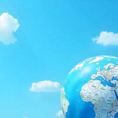 A Globe With Europe And Africa In Front Of A Blue Sky With White Clouds The Globe Is In The Lower Right Corner 21 Bad0