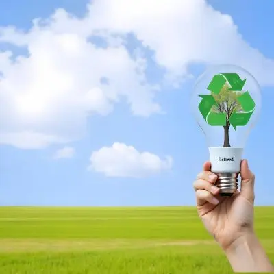 A Hand Holding A Light Bulb With A Green Recycle Symbol And A Tree Inside In A Green Field With A Blue Sky And White Clouds 78 B867