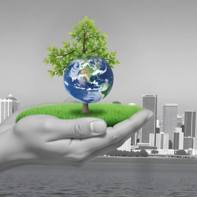 Hands Holding A Miniature Earth With A Tree Growing On Top A Patch Of Green Grass And A Cityscape In The Background 16 Af26
