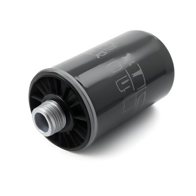 A Black Oil Filter With A Black Threaded Insert Lying On A Black Surface With A Slight Shadow Showcasing Its Cylindrical Shape And Construction 15 Cbc3