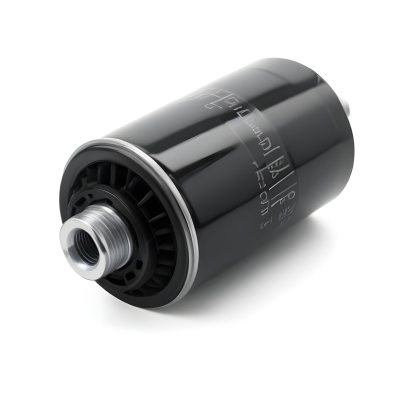 A Black Oil Filter With A Black Threaded Insert Lying On A Black Surface With A Slight Shadow Showcasing Its Cylindrical Shape And Construction 20 70fd