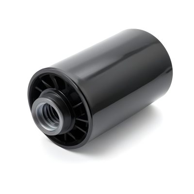 A Black Oil Filter With A Black Threaded Insert Lying On A Black Surface With A Slight Shadow Showcasing Its Cylindrical Shape And Construction 9 9642
