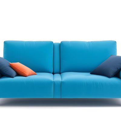 A Blue Sofa With Two Pillows One White And One White In A White Background 27 F5ff