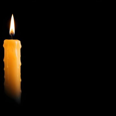 A Burning Candle With A Bright Flame The Wax Is Dripping Down The Side Casting A Warm Glow In A Dark Room 19 Eef8
