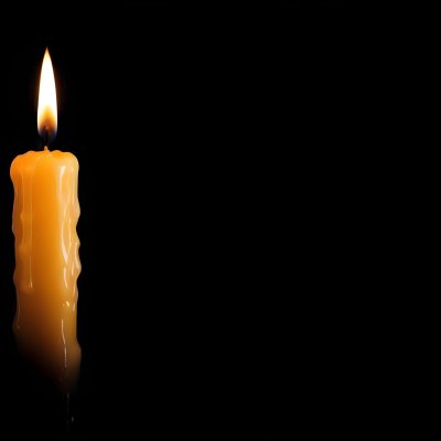 A Burning Candle With A Bright Flame The Wax Is Dripping Down The Side Casting A Warm Glow In A Dark Room 24 448e