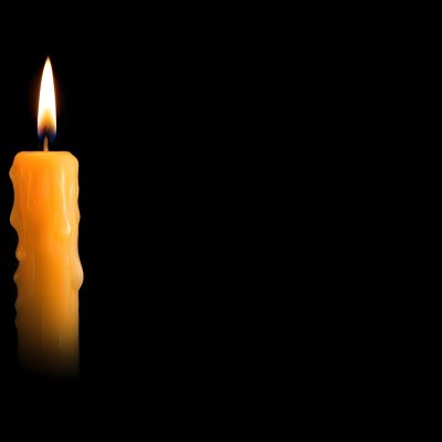 A Burning Candle With A Bright Flame The Wax Is Dripping Down The Side Casting A Warm Glow In A Dark Room 34 4ac7