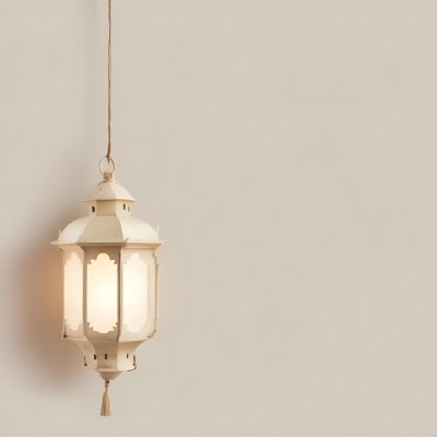 A Hanging Lantern With A Warm Glowing Light Against A Plain Beige Wall 21 4916