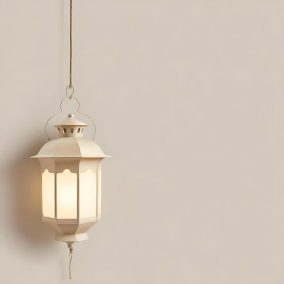 A Hanging Lantern With A Warm Glowing Light Against A Plain Beige Wall 24 9fa3