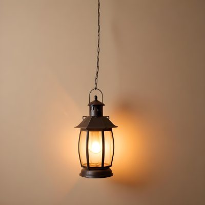 A Hanging Lantern With A Warm Glowing Light Against A Plain Beige Wall 3 670e