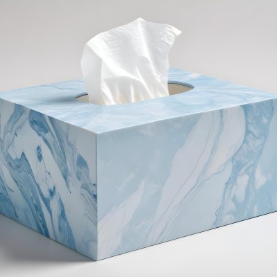 A Light Blue Tissue Box With A Marble Pattern Filled With White Tissues Sitting On A White Surface With A White Background 23 E5e0