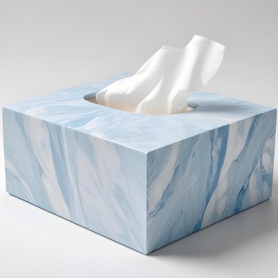 A Light Blue Tissue Box With A Marble Pattern Filled With White Tissues Sitting On A White Surface With A White Background 8 C8f5