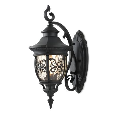 An Ornate Black Metal Outdoor Wall Sconce With A Glass Pane Design Mounted On A Brick Wall 5 425f