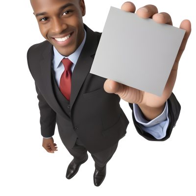 A Black Man In A Business Suit Approximately 30 Years Old With Short Hair And A Friendly Smile He Is Holding A Blank Gray Square In Front Of Him The Background Is Plain White Emphasizing The Subject 4 5dc2