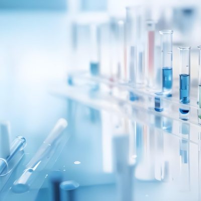 Several Transparent Glass Vials And Test Tubes Filled With Clear Liquid Arranged On A Reflective Surface With A Blurred Laboratory Background 7 Bd61