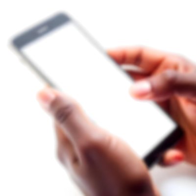 Dark Skinned Hands Holding A Smartphone With A Blank White Screen One Finger Is Holding The Screen Isolated On A White Background 3 E2a1