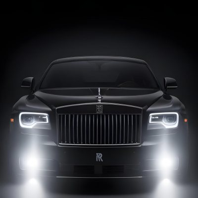 A Sleek Dark Colored Luxury Sedan With A Prominent Grille Featuring The Rolls Royce Logo Illuminated Headlights And A Minimalist Elegant Design 19 Bd03