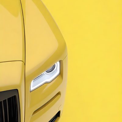 Yellow Rolls Royce Front View Headlight On Yellow Background 8 7dbb